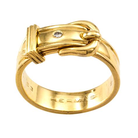 gold ring hermes in black